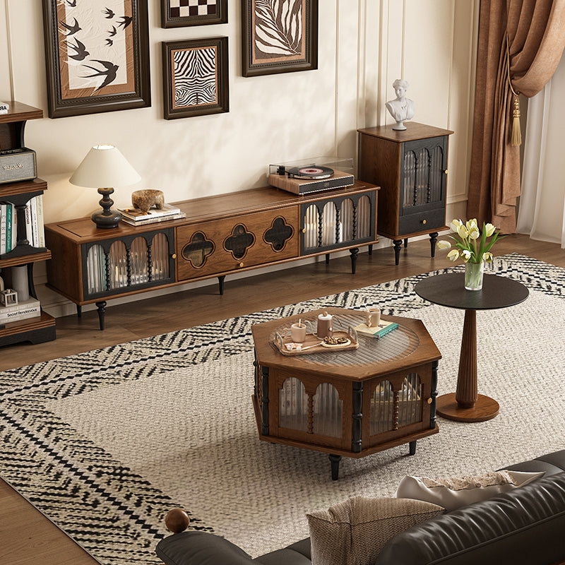 Living room with wooden furniture, including a coffee table and mid century tv stand, in a well-decorated room.