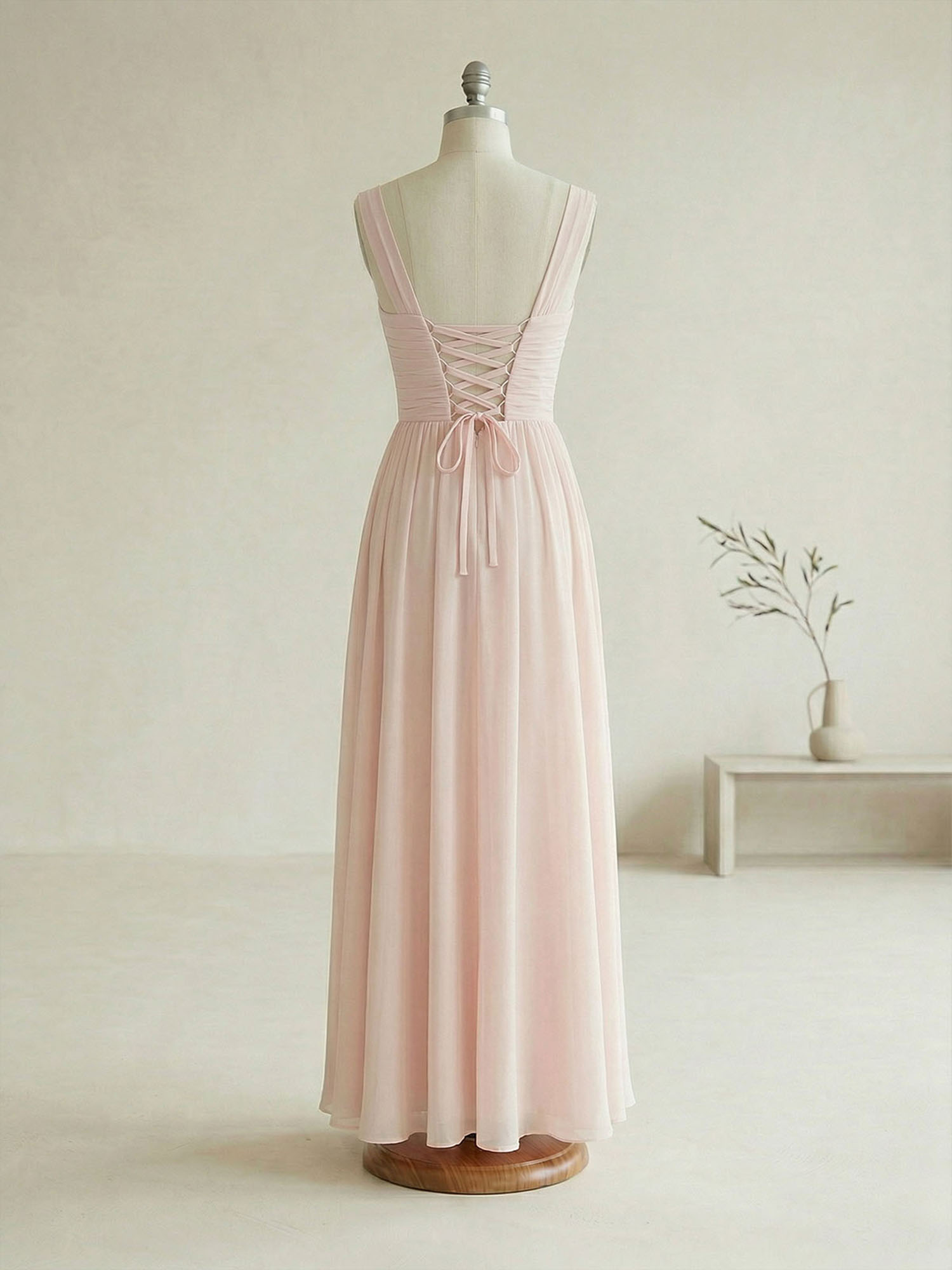 Elegant Soft Blush Twist-Front Chiffon Maxi Gown