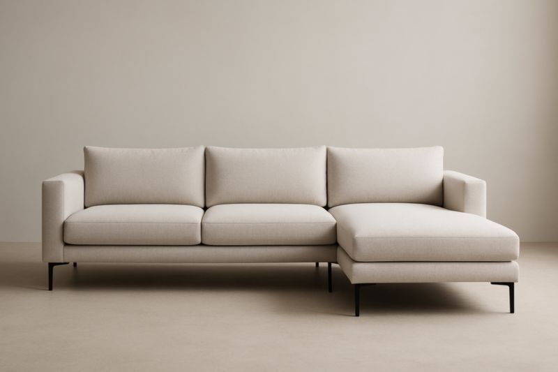 Canapé d'angle en tissu beige avec méridienne