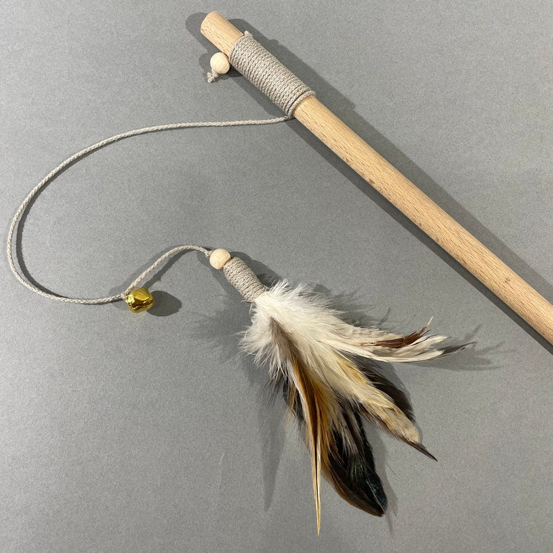Natural cat teaser toy with feathers and bell