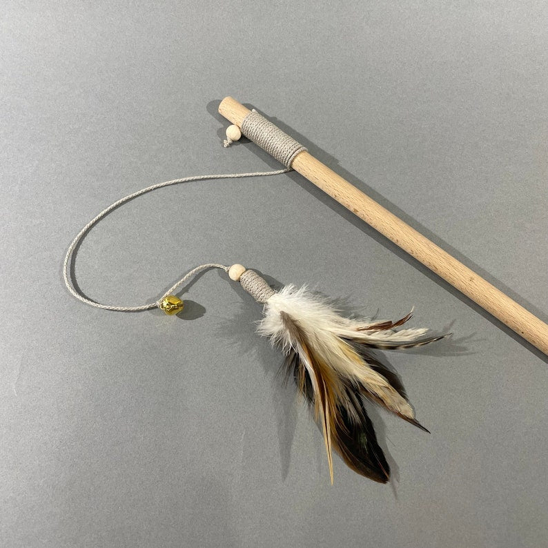Natural cat teaser toy with feathers and bell