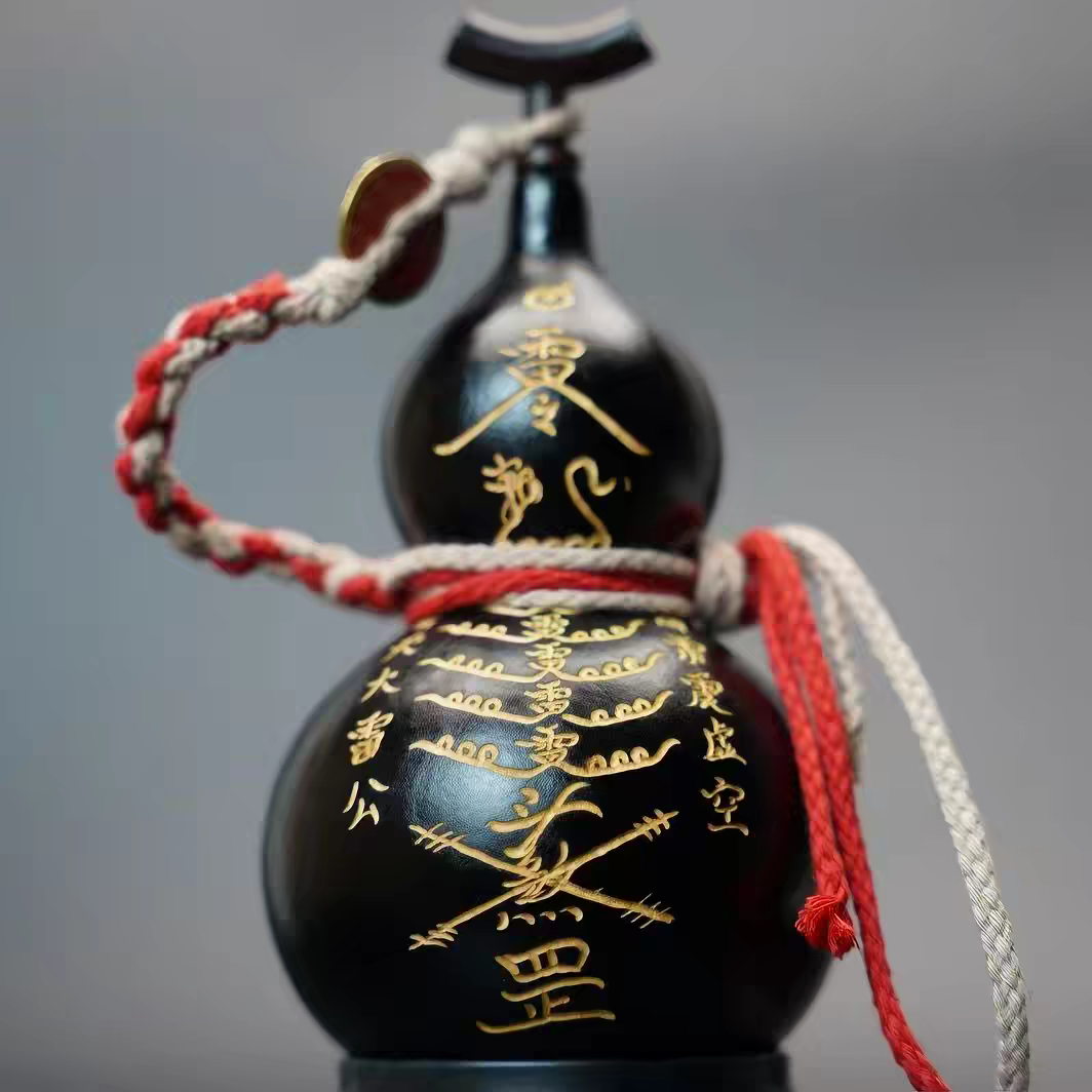 Black Hand-Carved Gourd Flask with Five Thunder Talismans - Feng Shui Calabash Bottle for Protection, Fortune & Positive Energy. Also used as a Decorative Gourd Art Piece & Spiritual Ornament for Home & Outdoor Display.