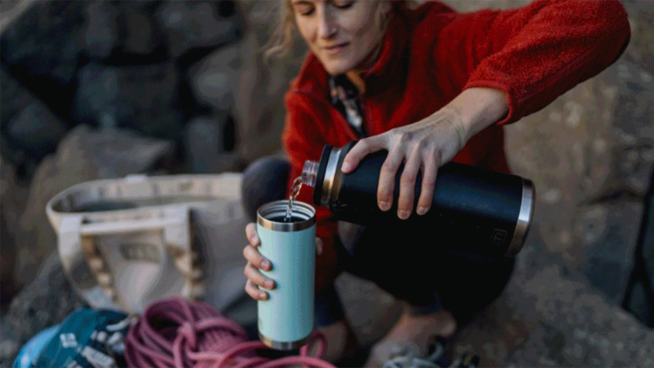 Goes to CNN page of YETI best products and the image shows a woman pouring water from a yeti bottle into a yeti tumbler