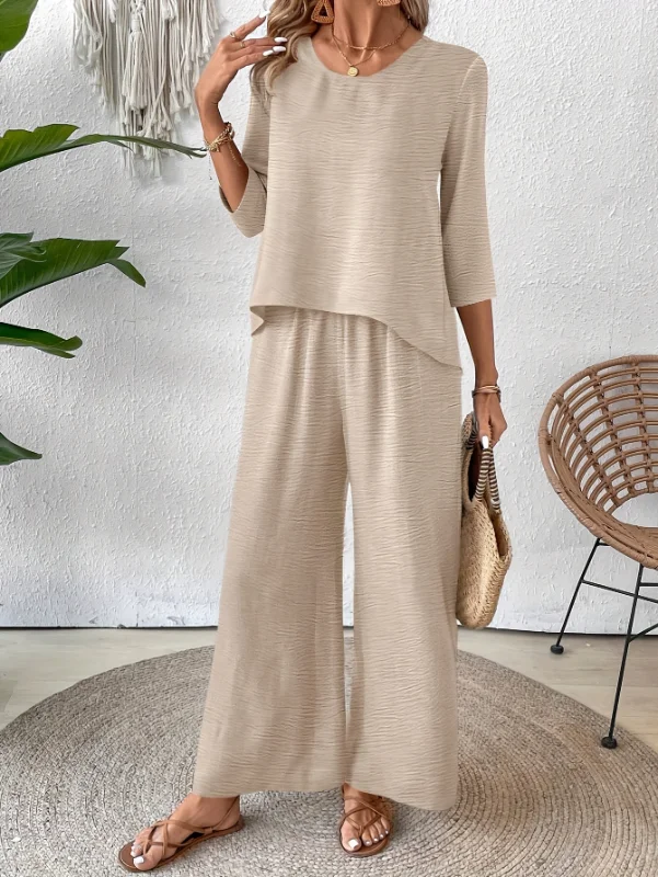 Minimalist Round Neck Three Quarter Sleeve Asymmetrical Hem Textured Top Elastic Waist Wide Leg Pant Two Piece Women Outfit