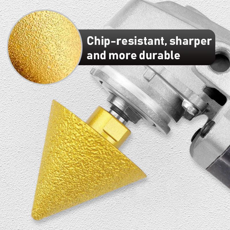 Gold chip-resistant cone grinding bit attached to power tool, close-up texture view