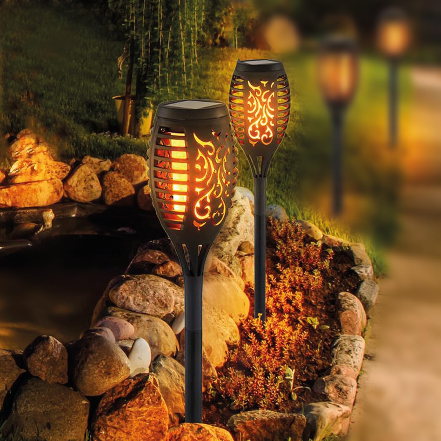 Solar-powered simulated flame lawn light