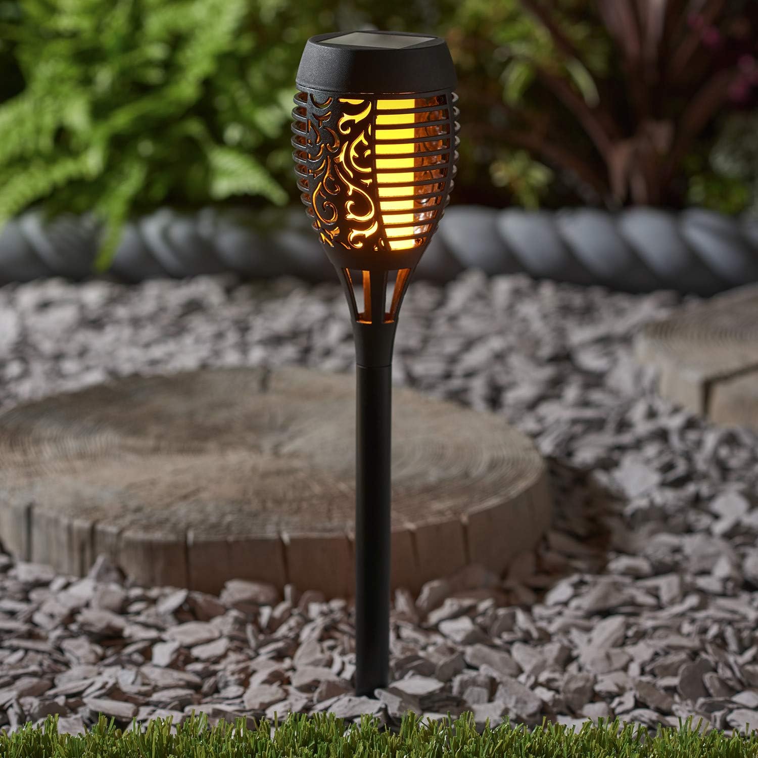 Solar-powered simulated flame lawn light