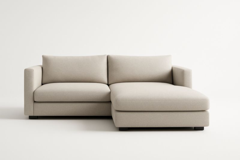 Divano angolare in tessuto beige con chaise longue