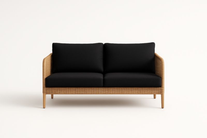 Divano a due posti in rattan con cuscini neri