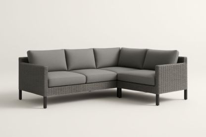 Divano angolare da giardino in rattan sintetico grigio con cuscini in tessuto di poliestere