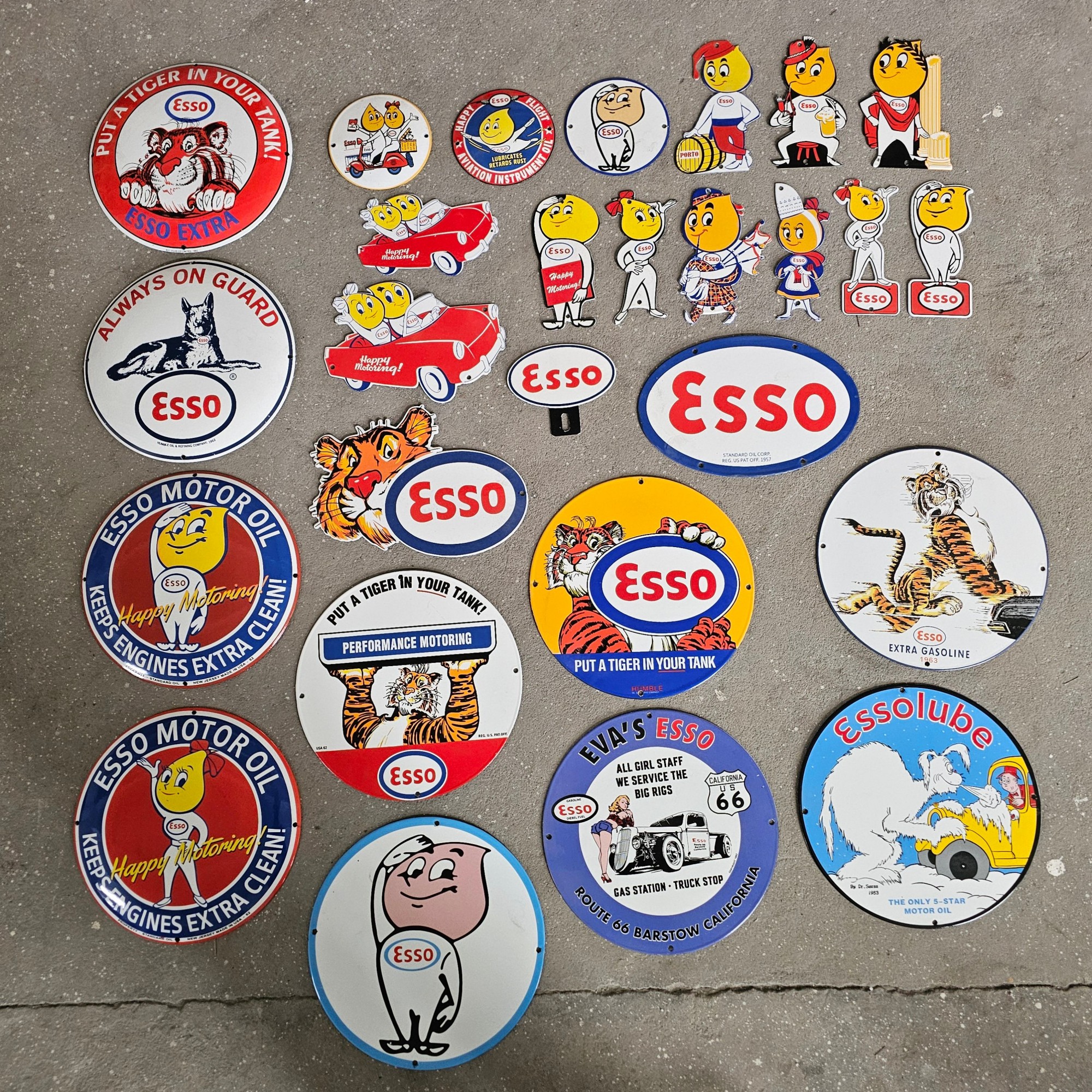 DIE CUT LOTS OF ESSO BOY AND GIRL GAS OIL PORCELAIN SIGN