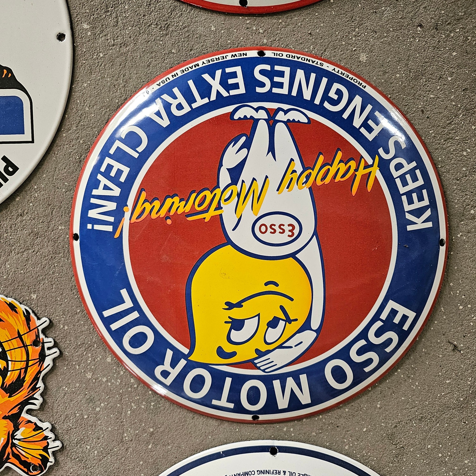 DIE CUT LOTS OF ESSO BOY AND GIRL GAS OIL PORCELAIN SIGN