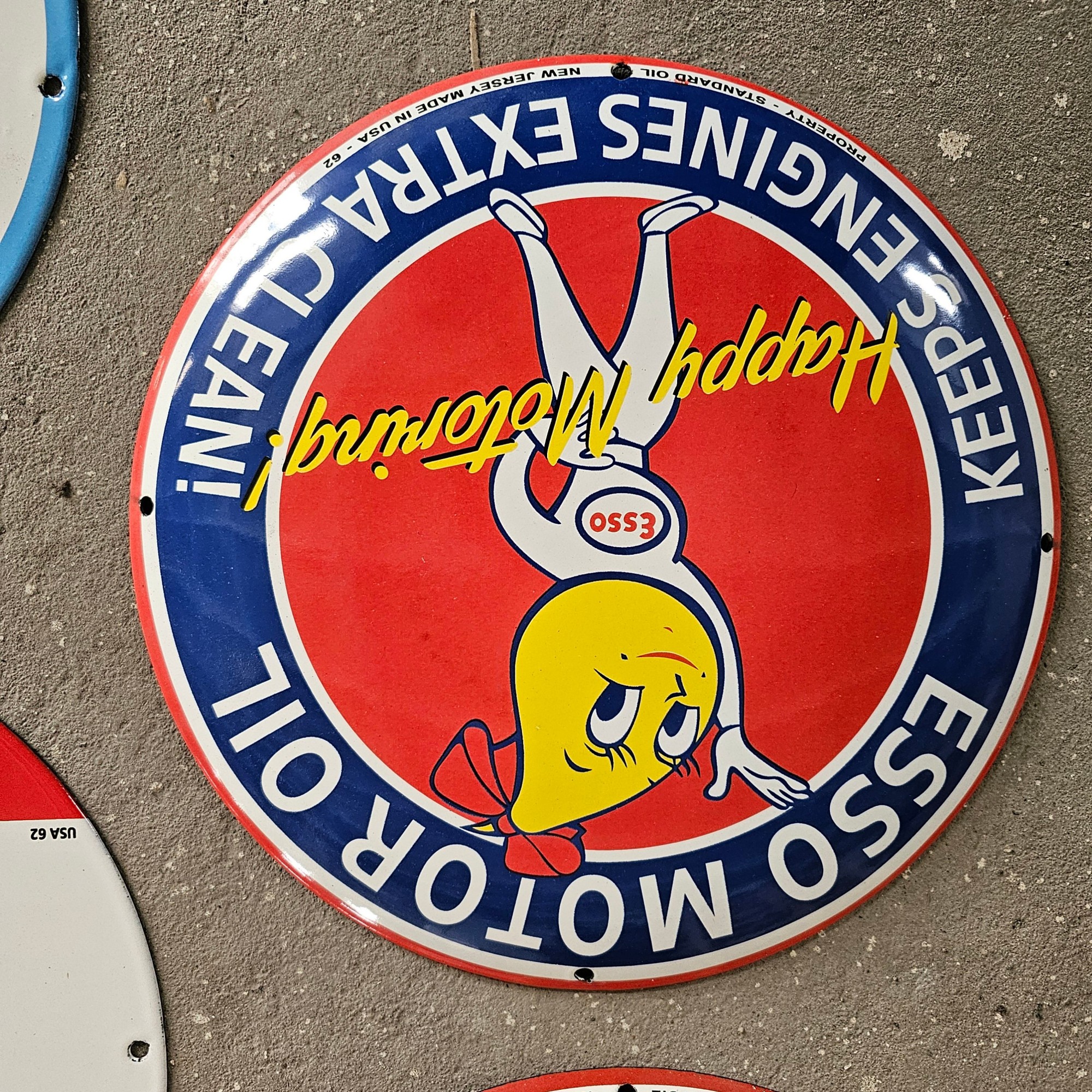 DIE CUT LOTS OF ESSO BOY AND GIRL GAS OIL PORCELAIN SIGN