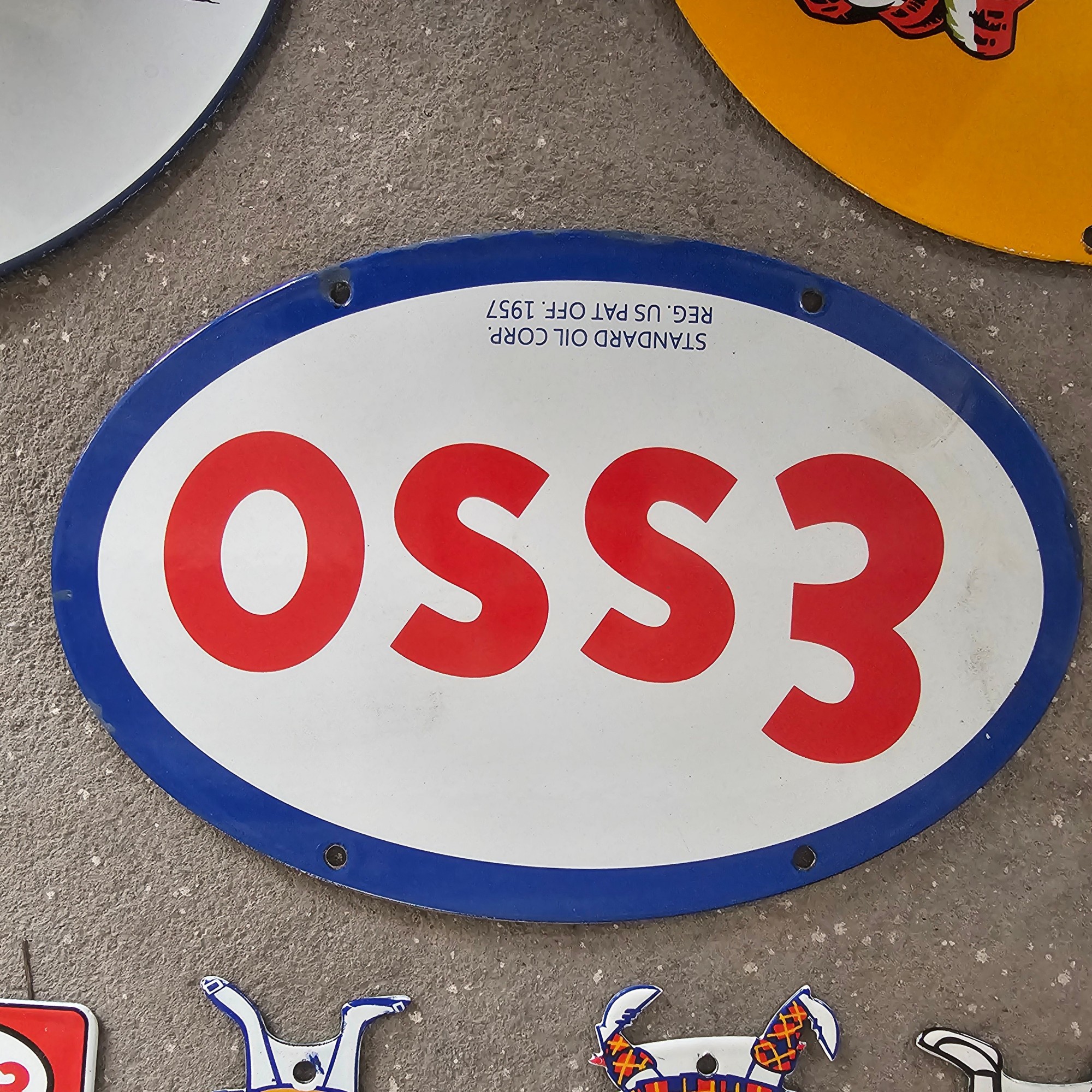 DIE CUT LOTS OF ESSO BOY AND GIRL GAS OIL PORCELAIN SIGN