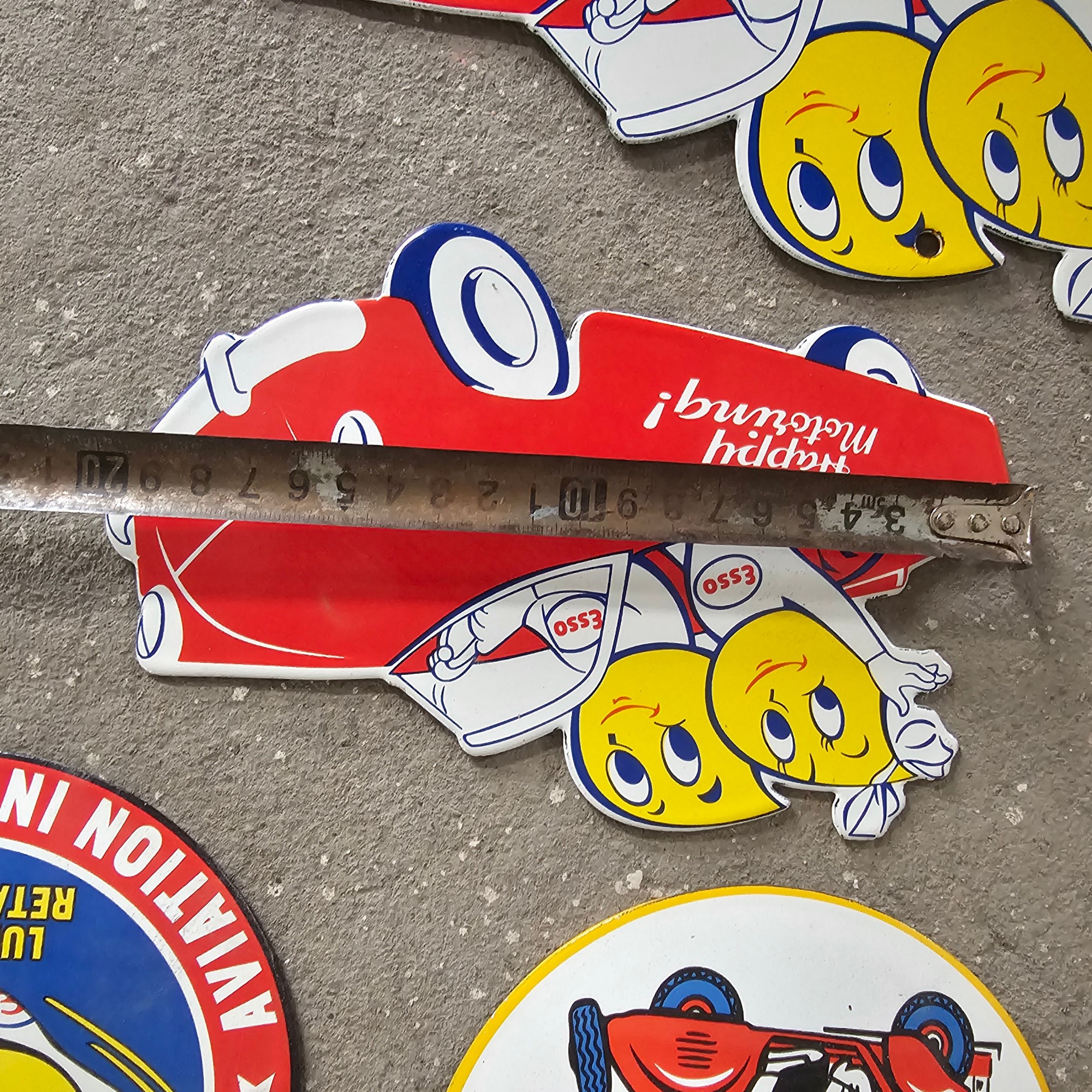 DIE CUT LOTS OF ESSO BOY AND GIRL GAS OIL PORCELAIN SIGN