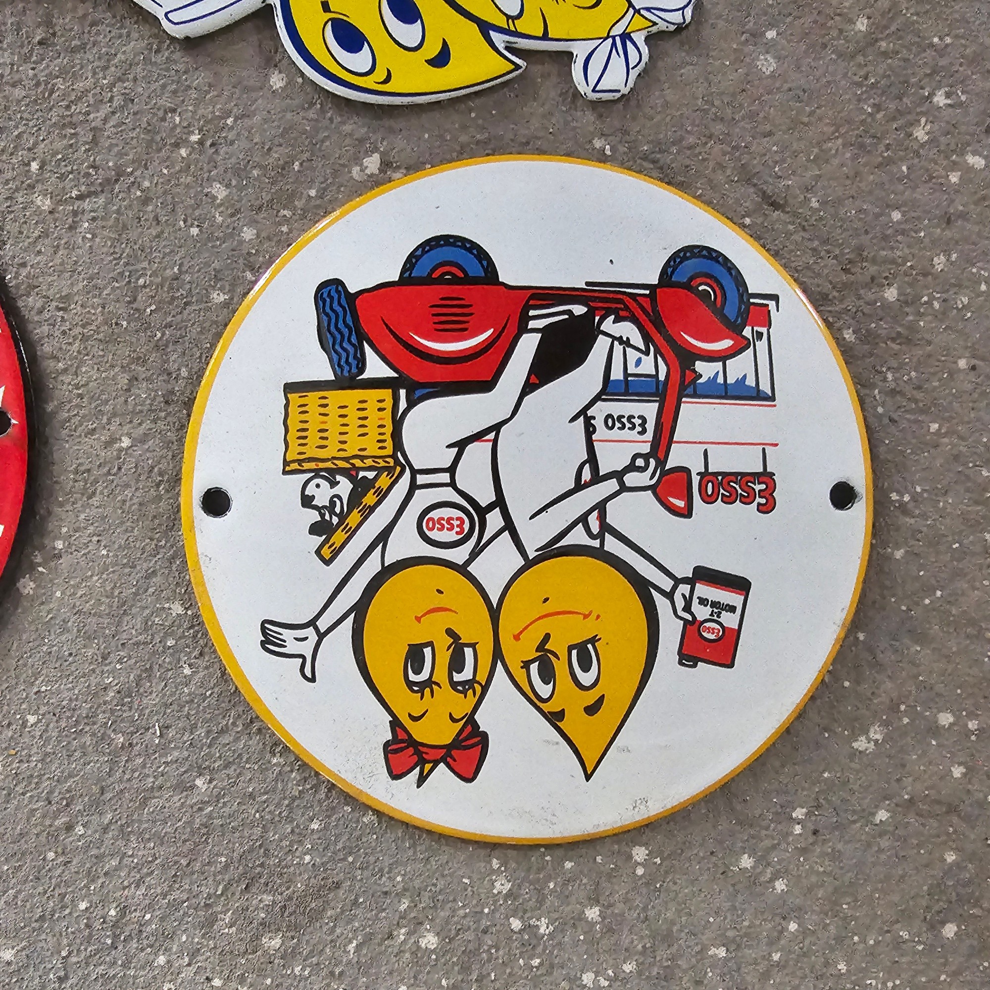 DIE CUT LOTS OF ESSO BOY AND GIRL GAS OIL PORCELAIN SIGN