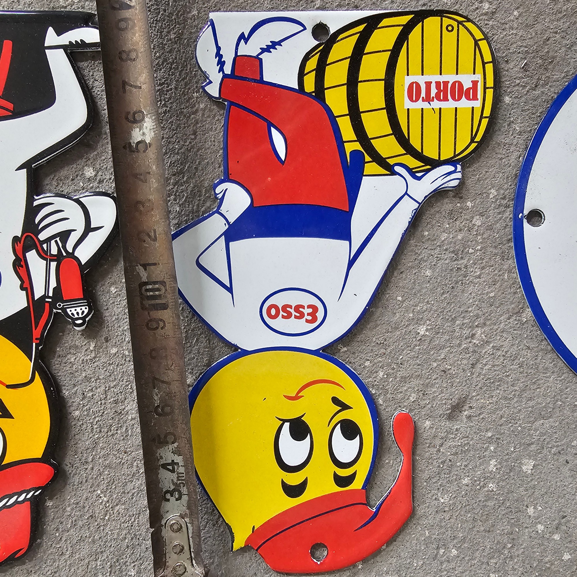 DIE CUT LOTS OF ESSO BOY AND GIRL GAS OIL PORCELAIN SIGN