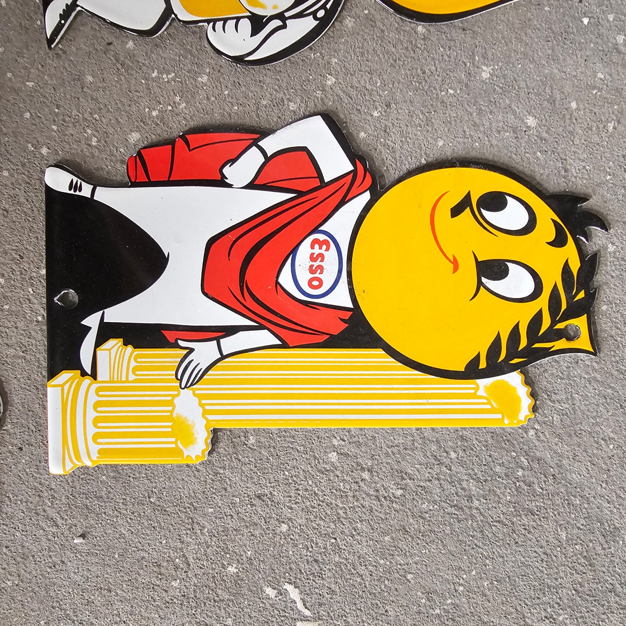 DIE CUT LOTS OF ESSO BOY AND GIRL GAS OIL PORCELAIN SIGN