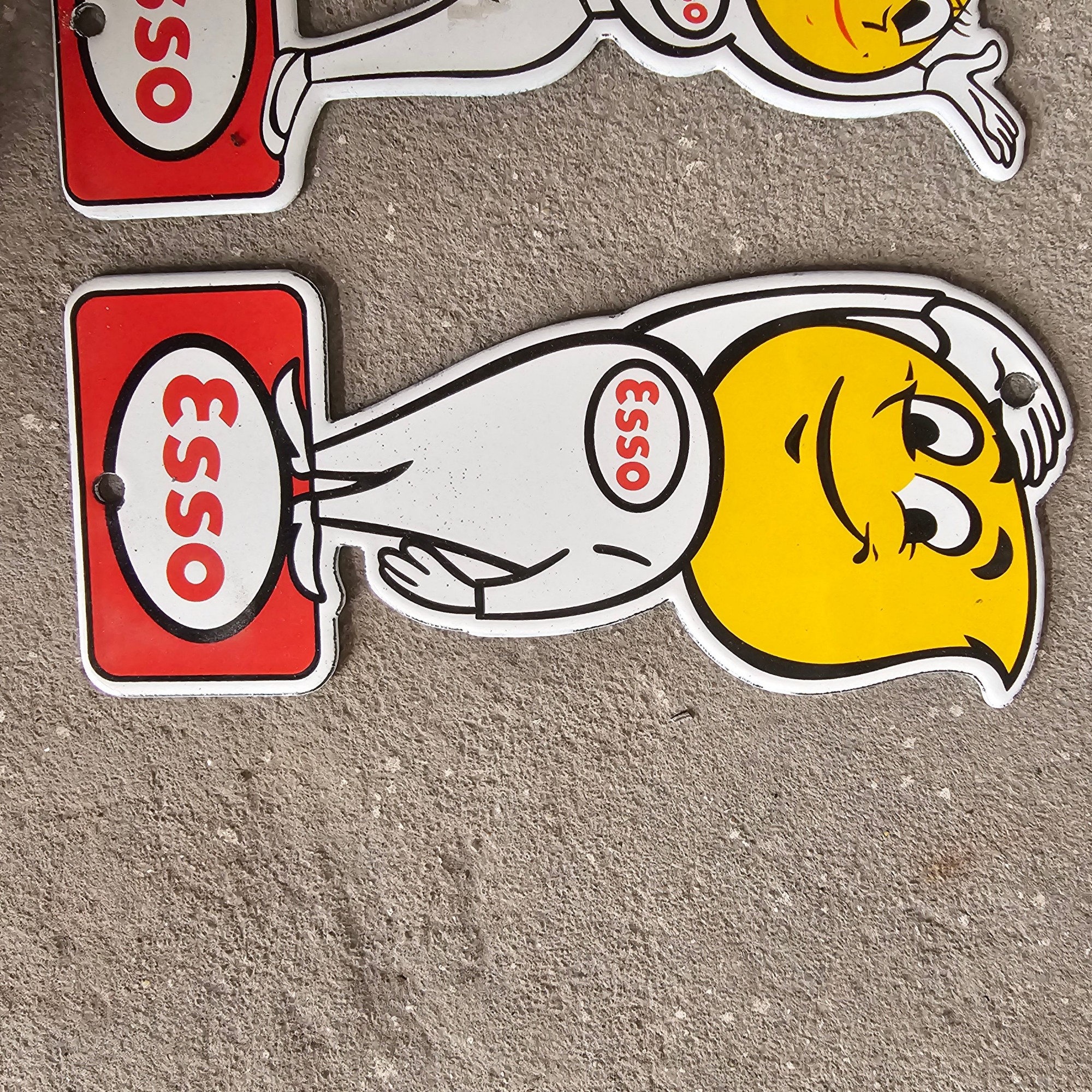 DIE CUT LOTS OF ESSO BOY AND GIRL GAS OIL PORCELAIN SIGN