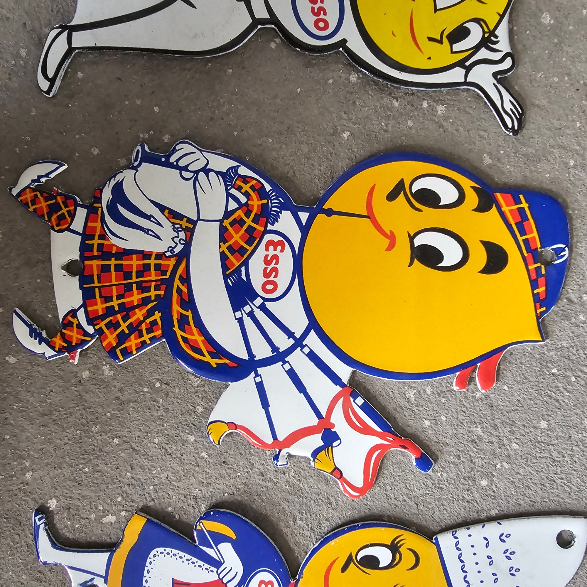 DIE CUT LOTS OF ESSO BOY AND GIRL GAS OIL PORCELAIN SIGN