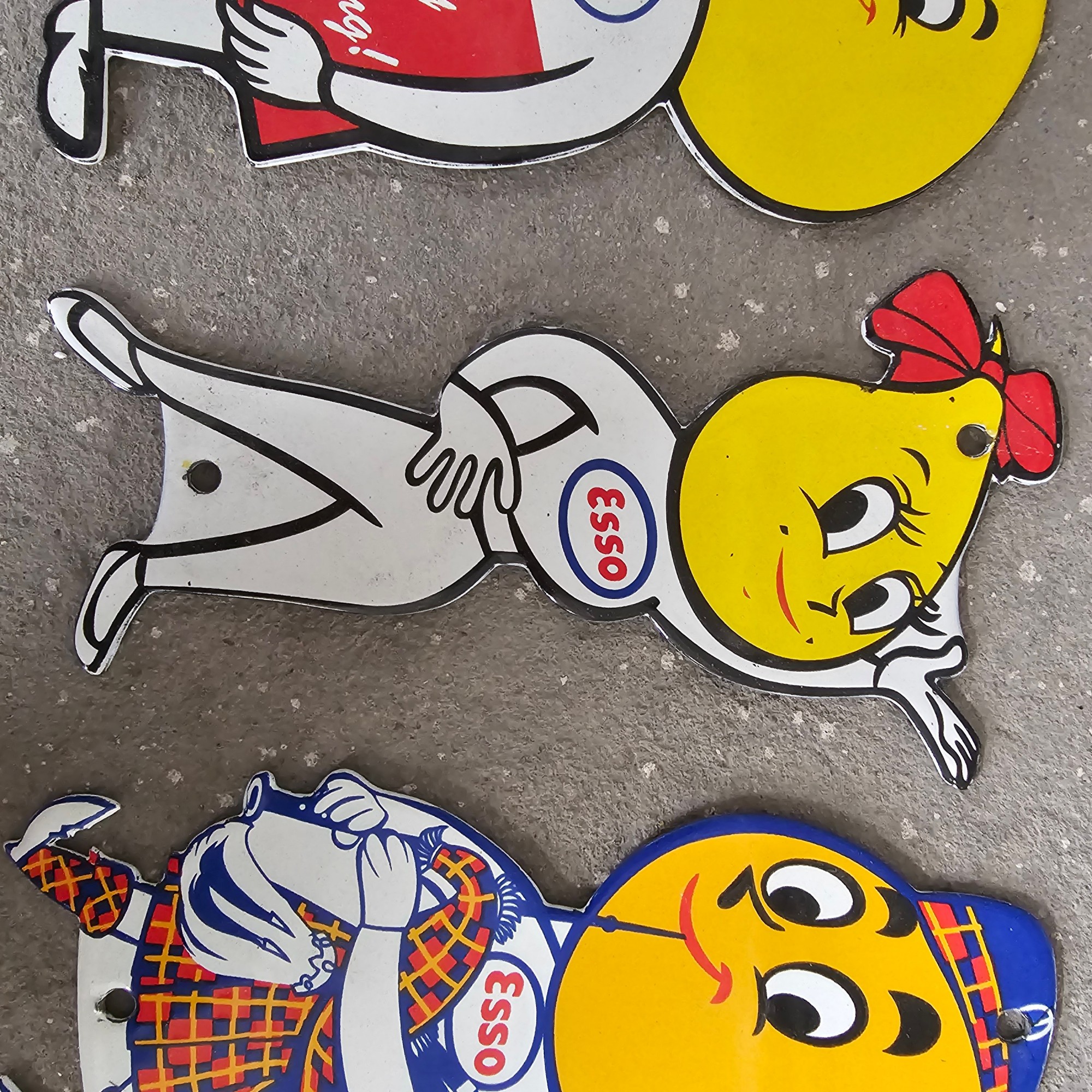 DIE CUT LOTS OF ESSO BOY AND GIRL GAS OIL PORCELAIN SIGN