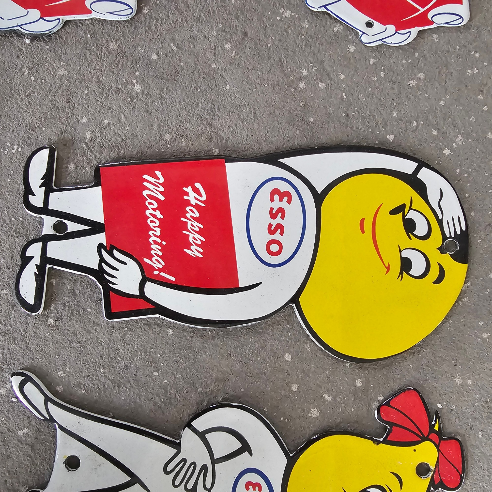 DIE CUT LOTS OF ESSO BOY AND GIRL GAS OIL PORCELAIN SIGN