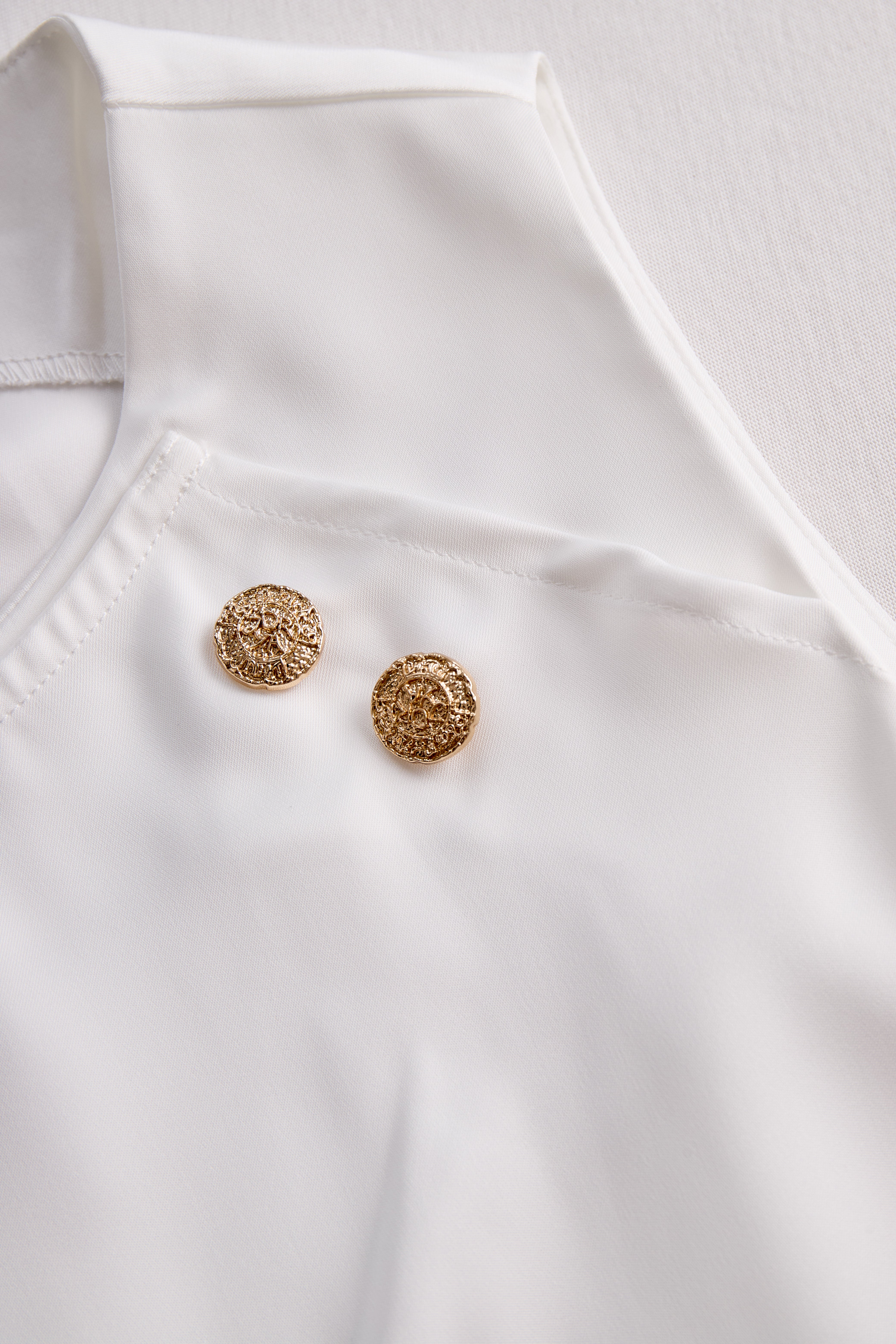 Elegant White Draped Top with Button Detail