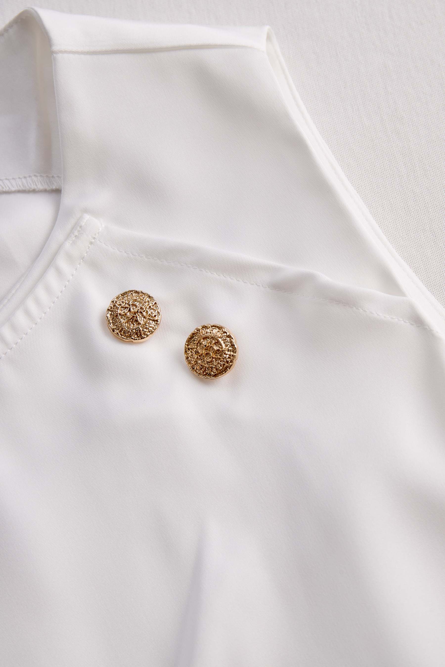 Elegant White Draped Top with Button Detail