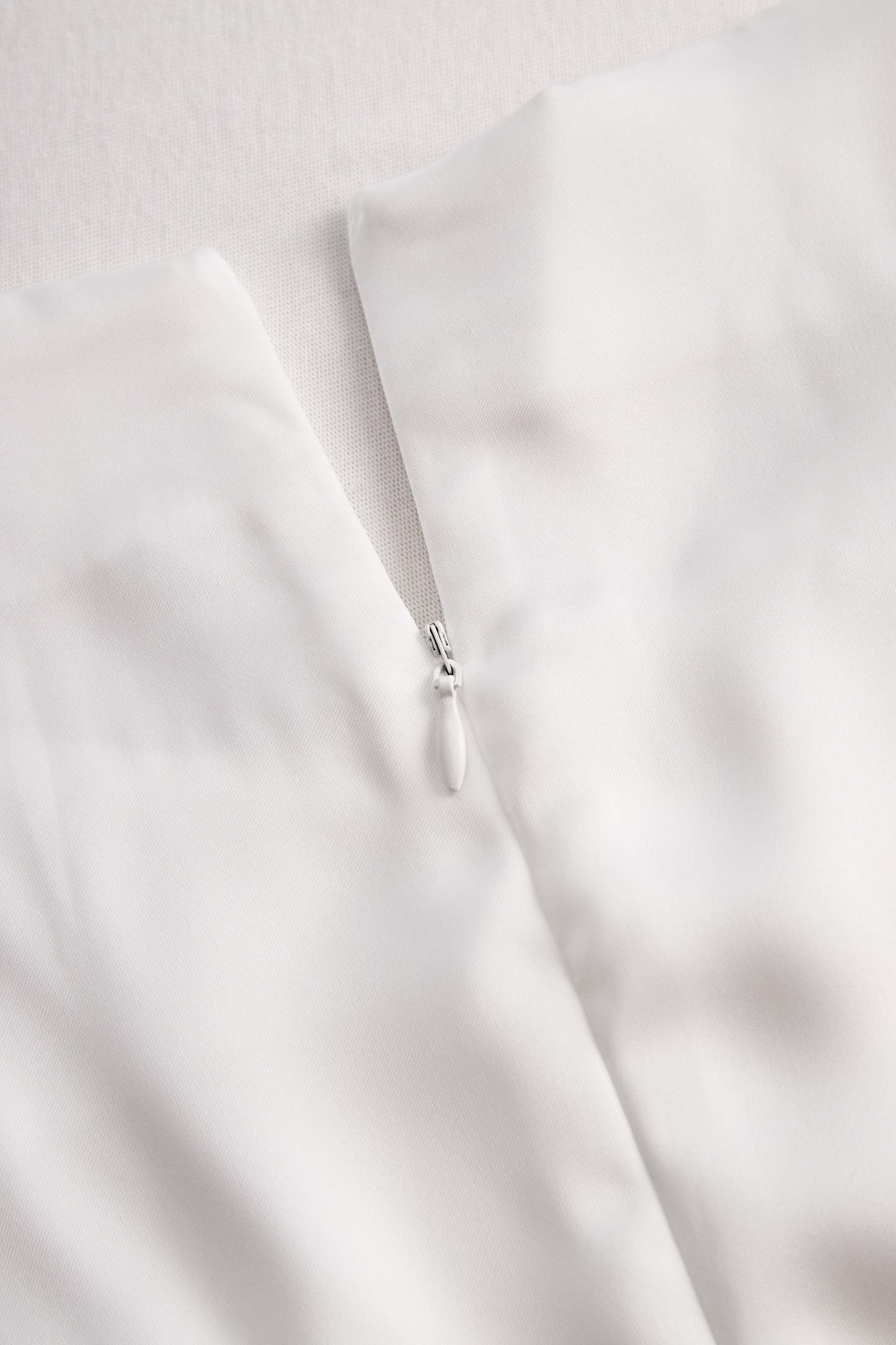 Elegant White Draped Top with Button Detail