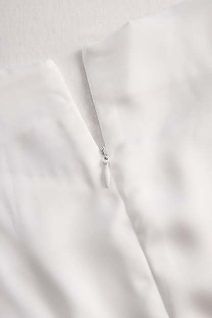 Elegant White Draped Top with Button Detail