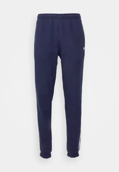 PANT TAPERED - Pantalon de survêtement - bleu marine