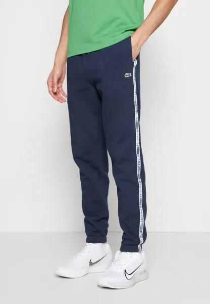 PANT TAPERED - Pantalon de survêtement - bleu marine