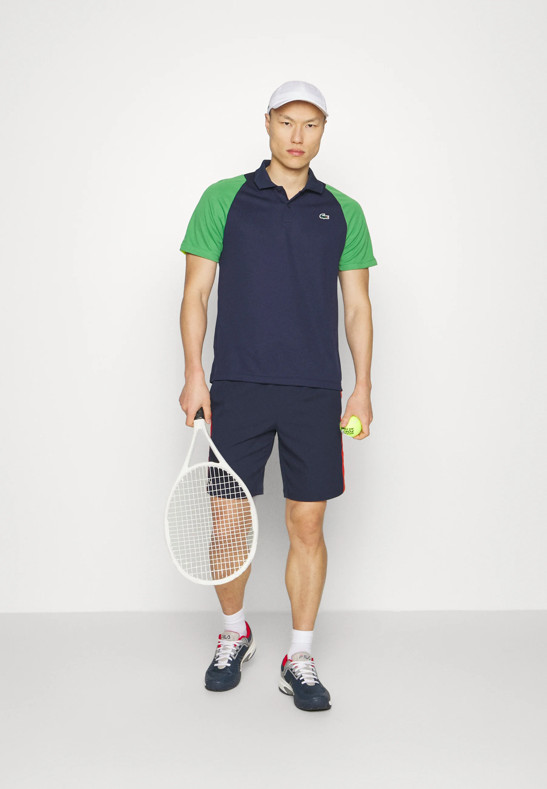 TENNIS - Polo - bleu marine/vert/jaune