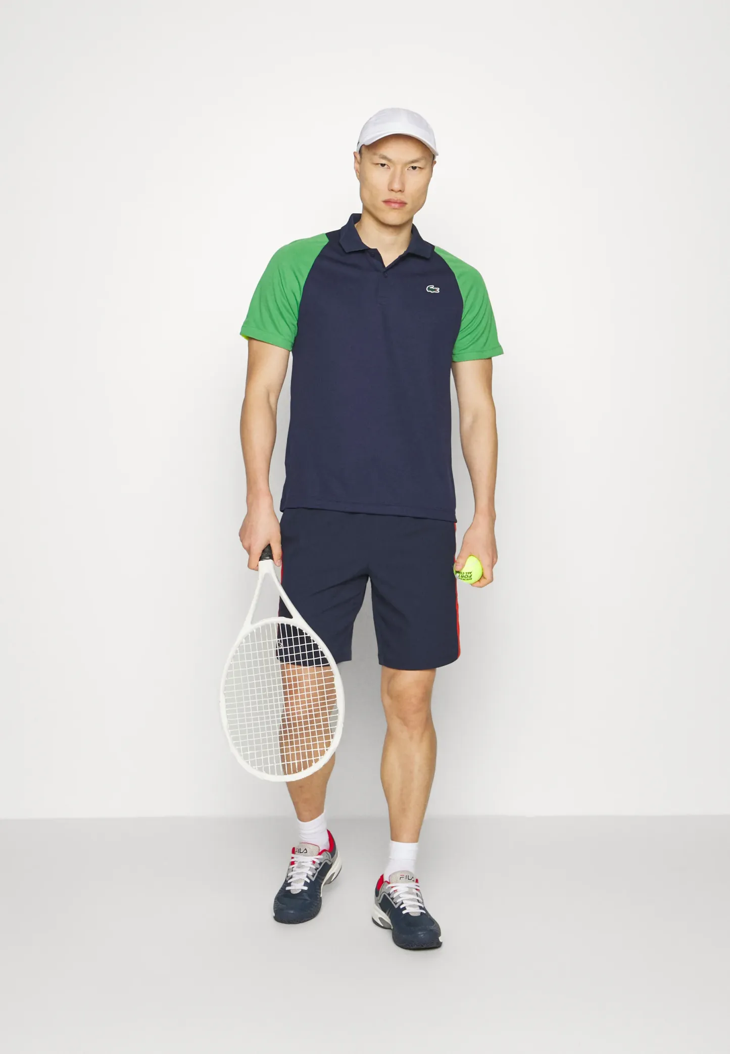 TENNIS - Polo - bleu marine/vert/jaune