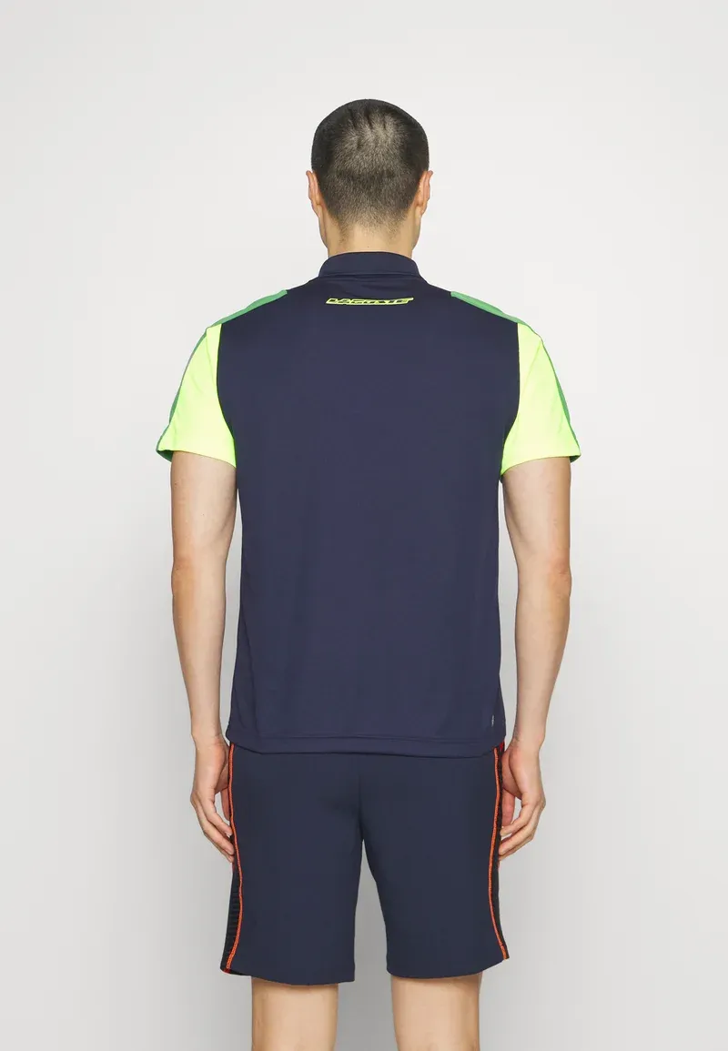 TENNIS - Polo - bleu marine/vert/jaune