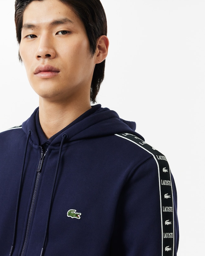 Sweatshirt zippé à capuche bandes siglées