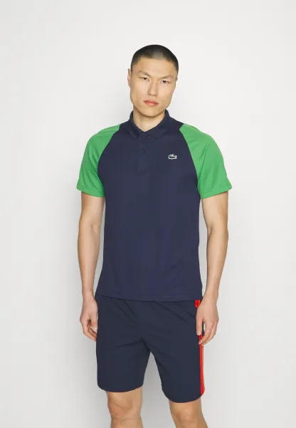 TENNIS - Polo - bleu marine/vert/jaune