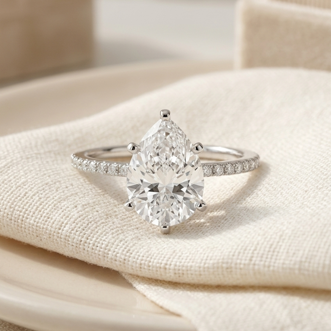 Bloom—Still Light Ring | Pear Diamond in Three-Quarter Coverage