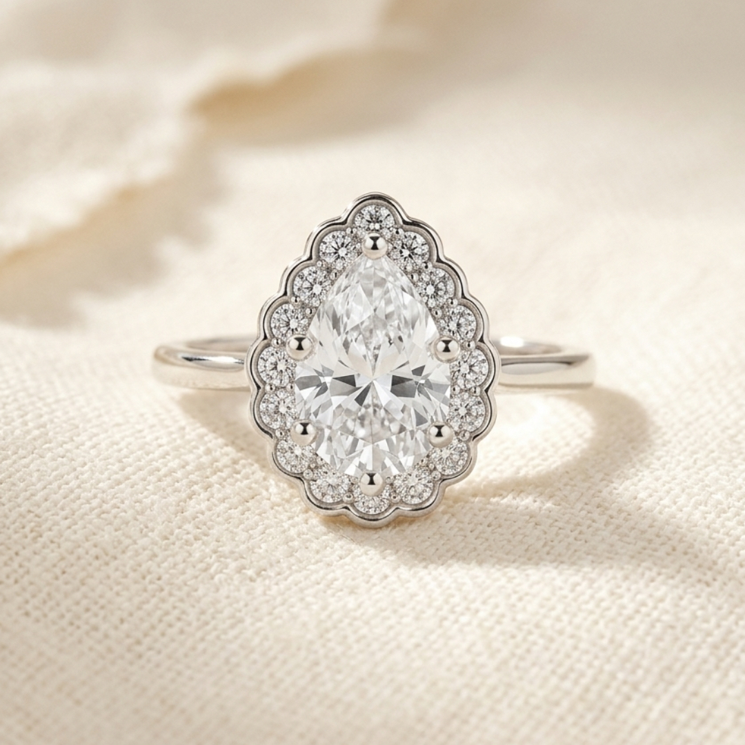 Bloom—Still Light Ring | Pear Diamond in Floral Halo
