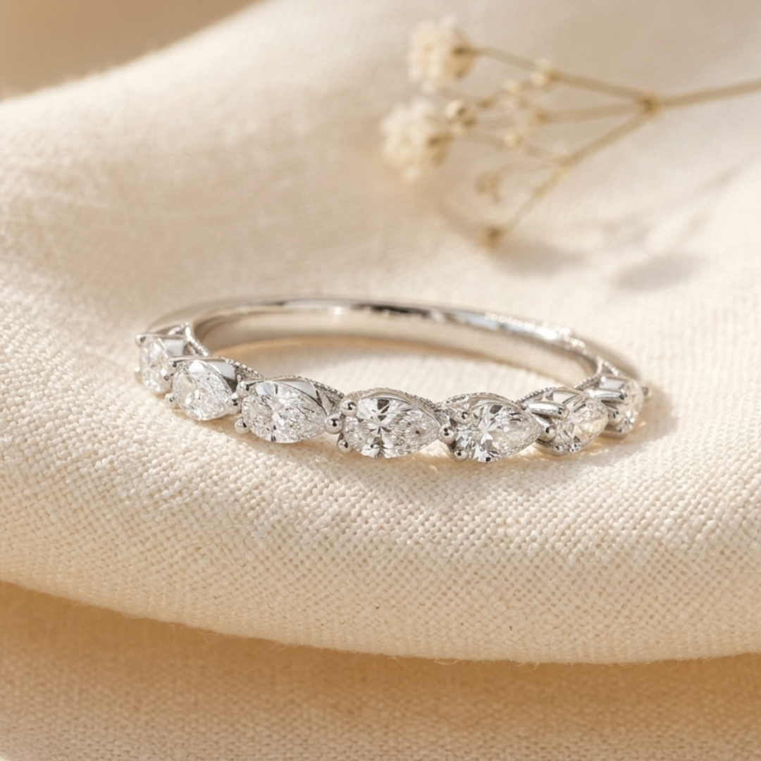 Milestone Band—Still Light Ring | Pear Diamond Half Eternity