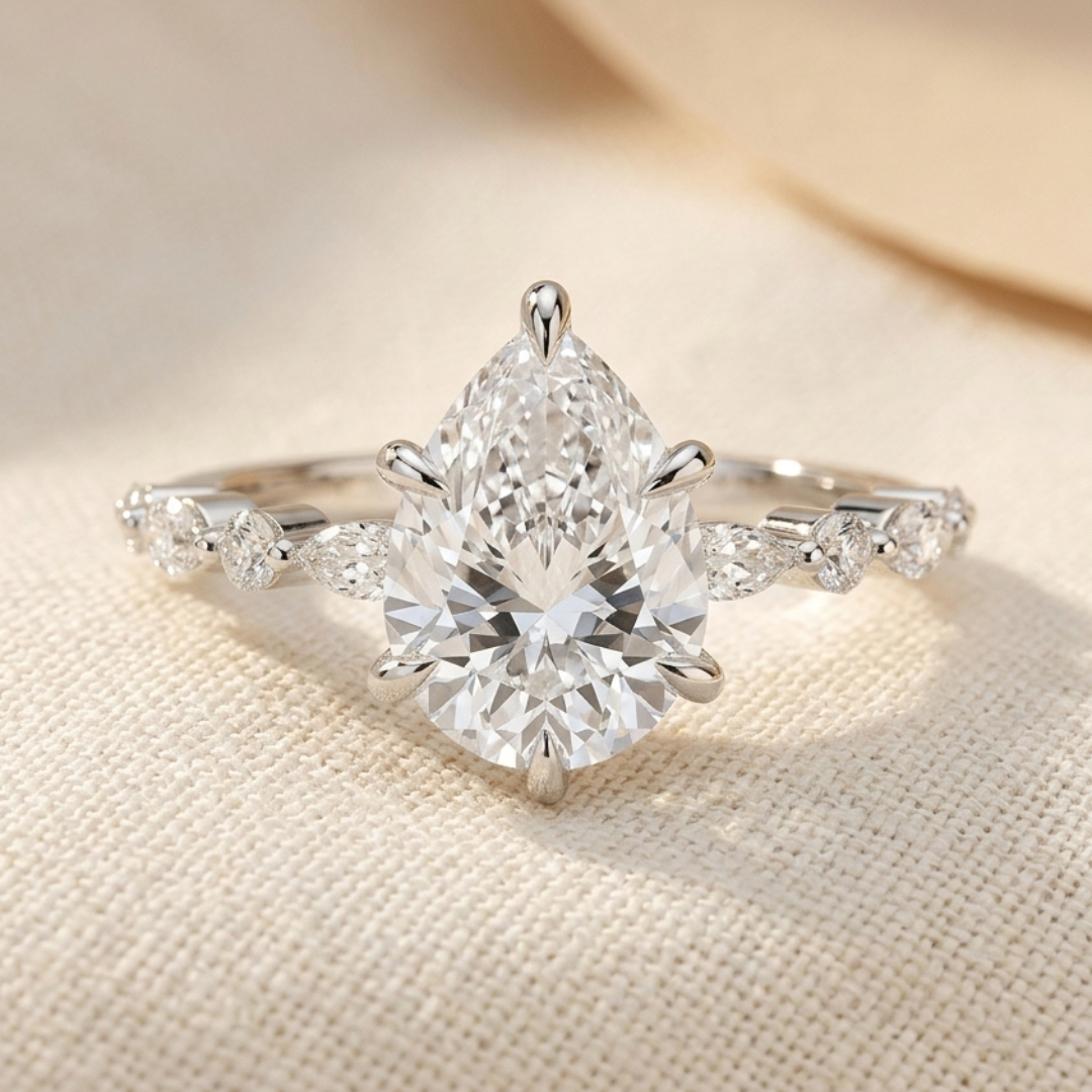 Bloom—Still Light Ring | Pear Diamond in Round Marquise Coverage