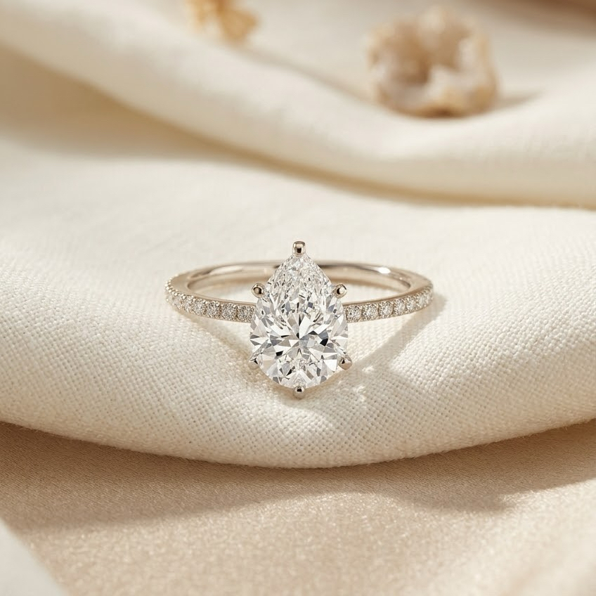 Bloom—Still Light Ring | Pear Diamond in Three-Quarter Coverage