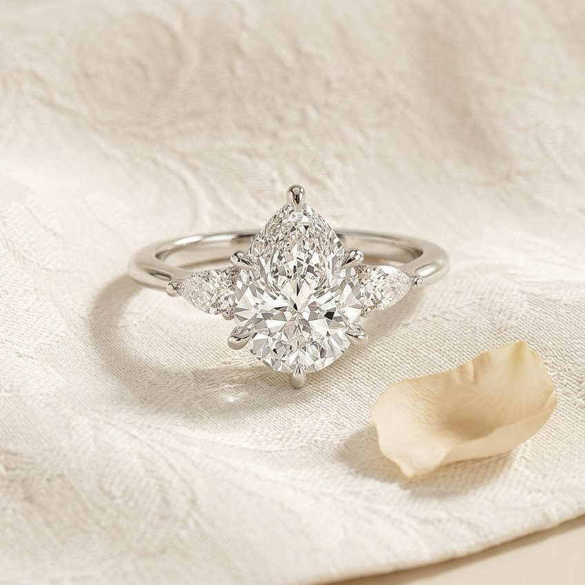 Bloom—Still Light Ring | Pear Diamond in Pear Three Stone