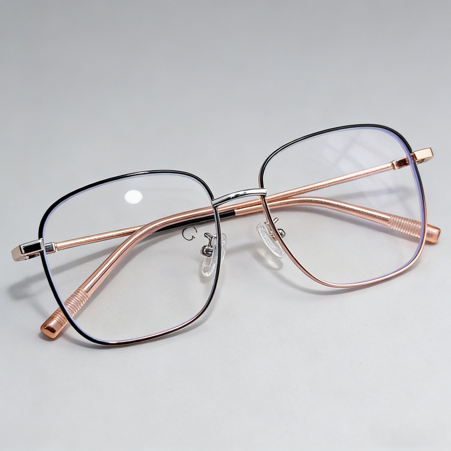 Comfortable nose pads on slimming large frame glasses