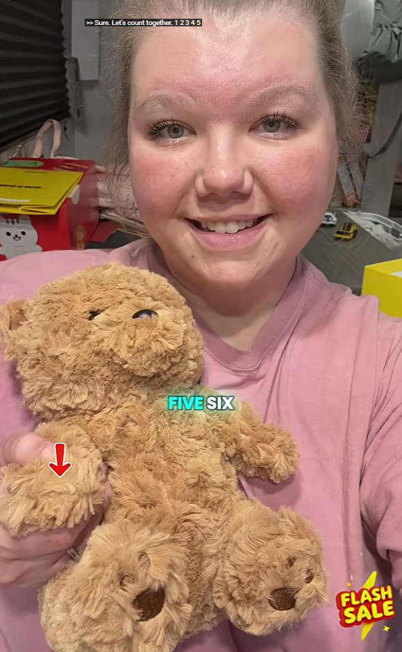 Customer happily showing a brown Meemo Bear and sharing its features