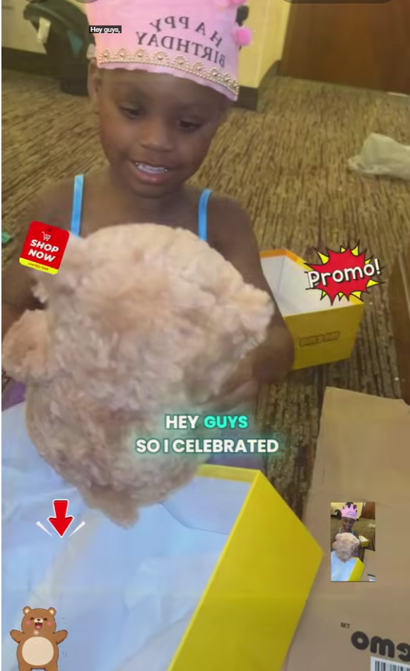 Child showing a brown Meemo Bear on her birthday party