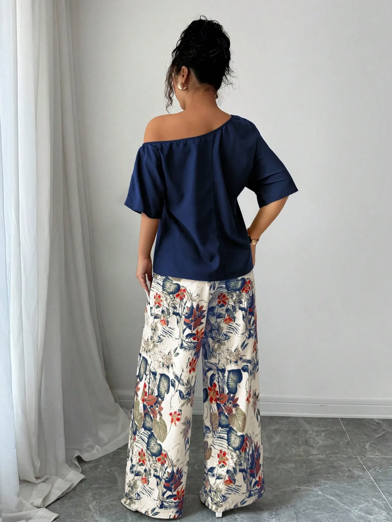 Women Summer Casual Solid Color Asymmetrical Shoulder Top And Floral Print Pants Set
