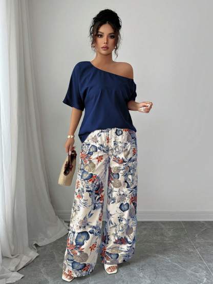 Women Summer Casual Solid Color Asymmetrical Shoulder Top And Floral Print Pants Set