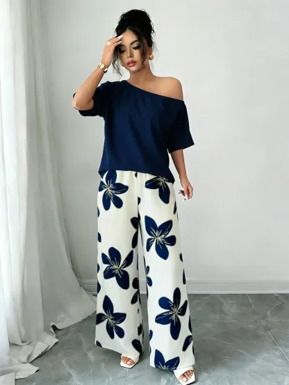 Women Summer Casual Solid Color Asymmetrical Shoulder Top And Floral Print Pants Set