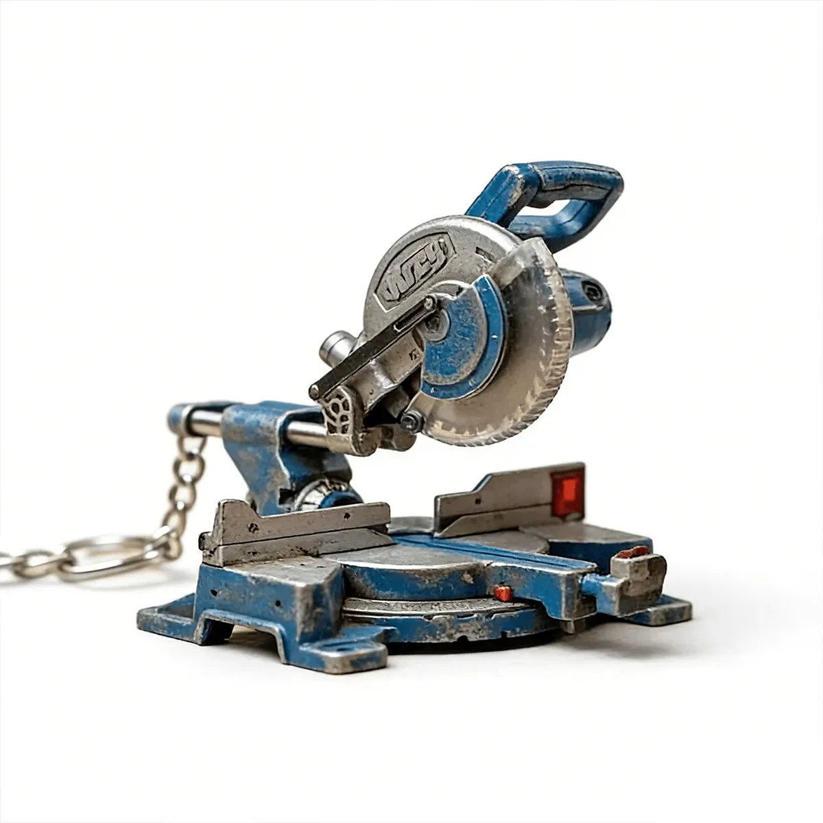 🛠️ 2-in-1 Mini Mitre Saw Keychain: Portable Cutting Tool + Collector's Item for Tool Enthusiasts